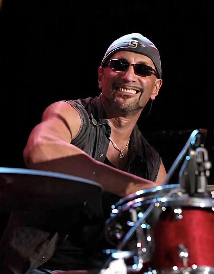 our hard hitting, experienced, highly professional drummer